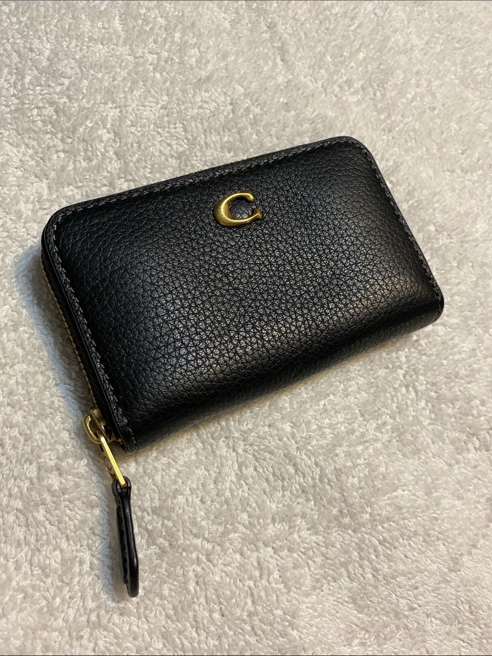 Coach Black Pebbled Leather Zip Card Holder with Gold 'C' Accent